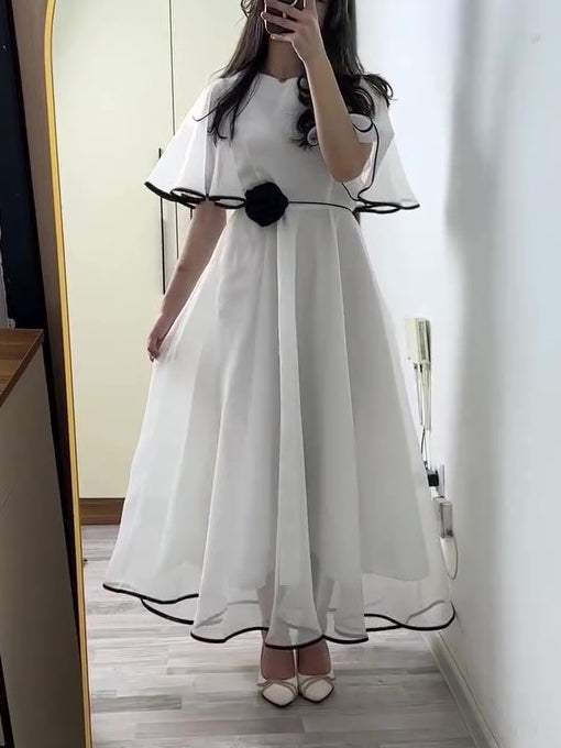 White Chiffon Maxi Dress With Black Trim And Floral Accent NorixaFashion.com