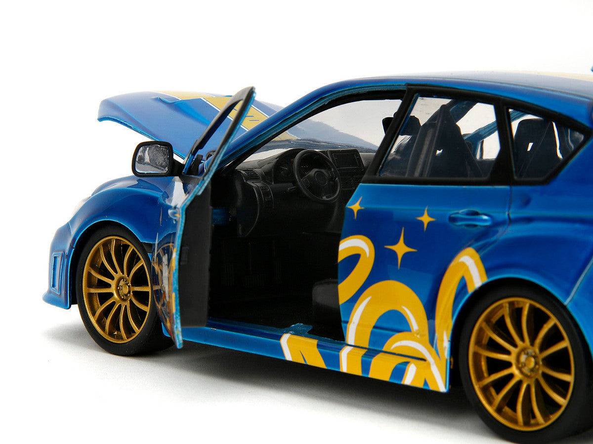 2012 Subaru Impreza WRX STI Blue Metallic with Graphics and Sonic The Hedgehog Diecast Figure "Sonic The Hedgehog" "Hollywood Rides" Series 1/24 Diecast Model Car by Jada LuxuryLifeWay Online Store