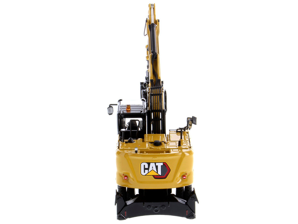 CAT Caterpillar M318 Wheeled Excavator Yellow with Operator "High Line" Series 1/50 Diecast Model by Diecast Masters LuxuryLifeWay Online Store