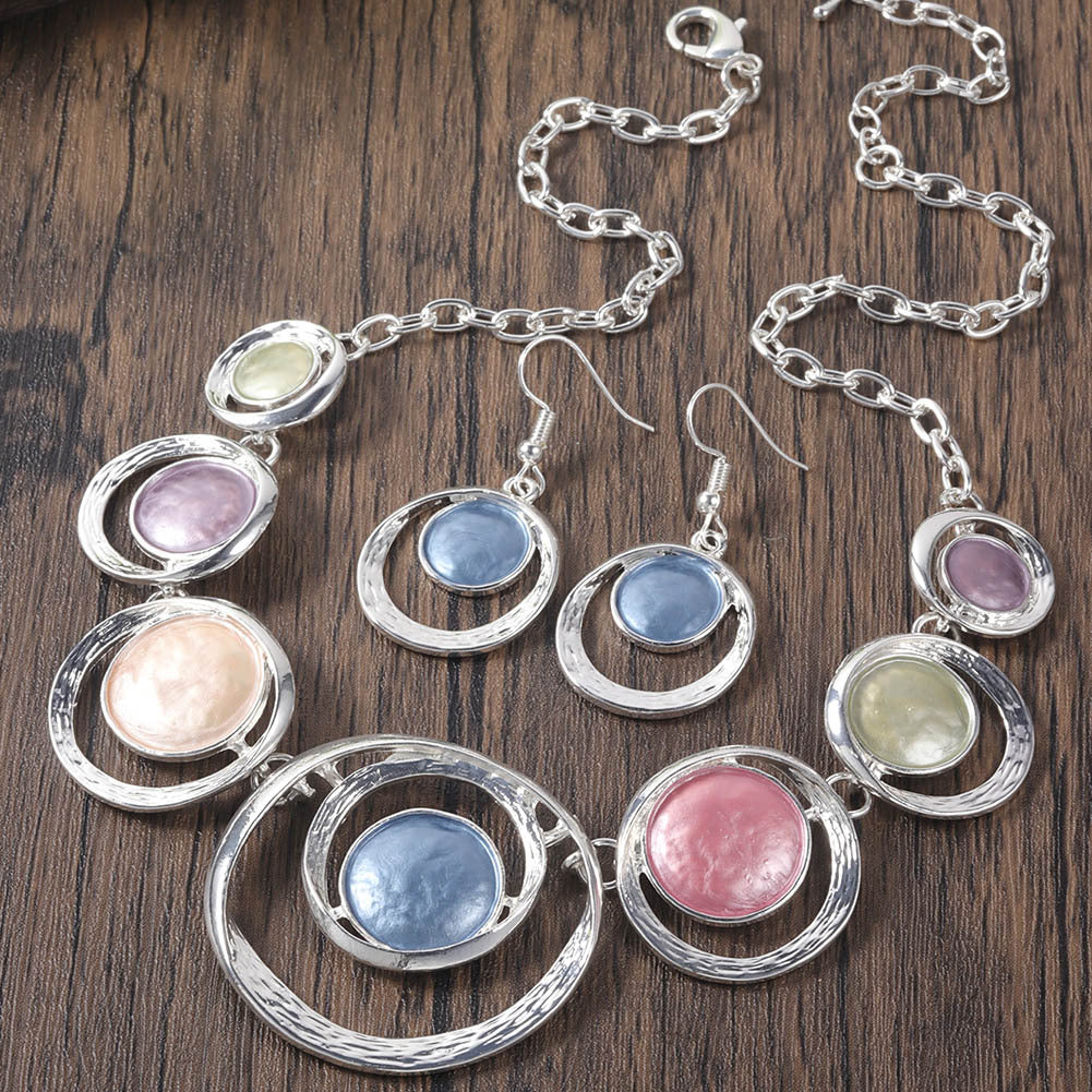 Retro Oil-dropped Hollow Round Earrings Women's Necklace LadyShow.Store