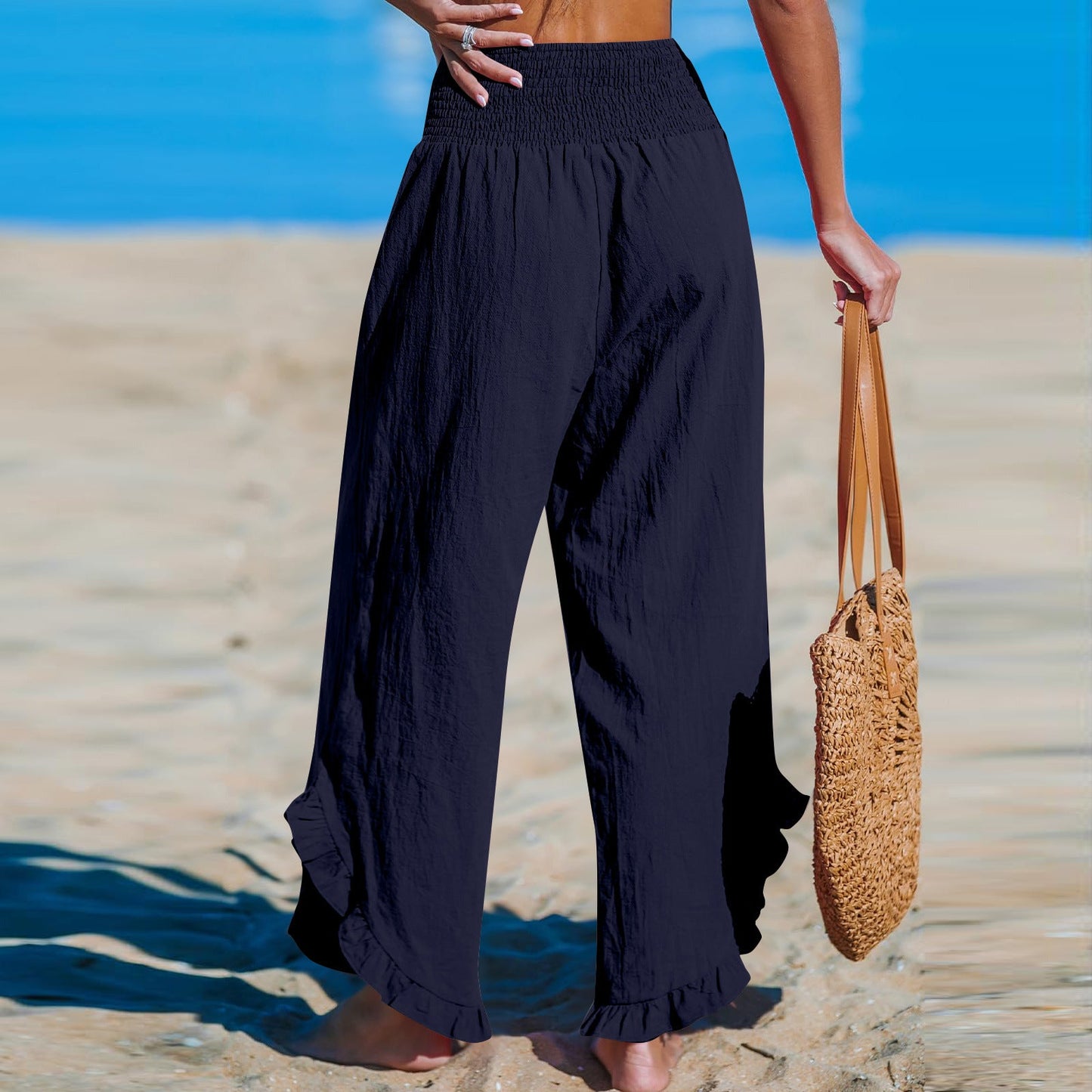 Pleated Asymmetrical Hem Cotton-linen Loose-fit Casual Pants NorixaFashion.com