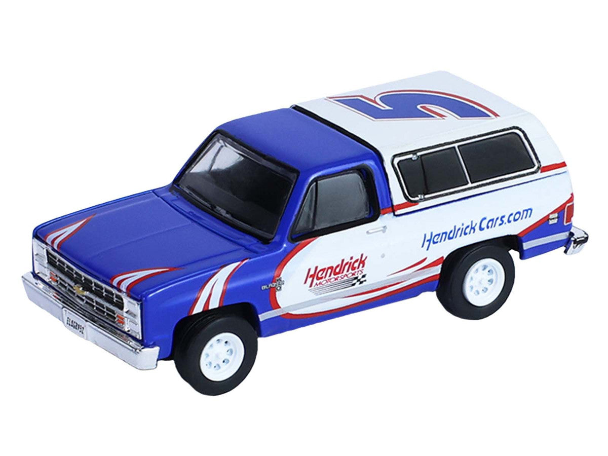 1986 Chevrolet K5 Blazer Blue and White and 1969 Chevrolet Camaro #5 Blue and White "Kyle Larson - Hendrick Motorsports" with Tandem Car Trailer "Racing Hitch & Tow" Series 6 1/64 Diecast Model Cars by Greenlight LuxuryLifeWay Online Store
