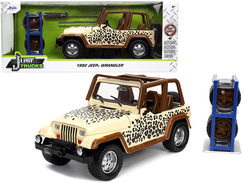 1992 Jeep Wrangler Tan and Brown with Graphics and Extra Wheels "Just Trucks" Series 1/24 Diecast Model Car by Jada LuxuryLifeWay Online Store