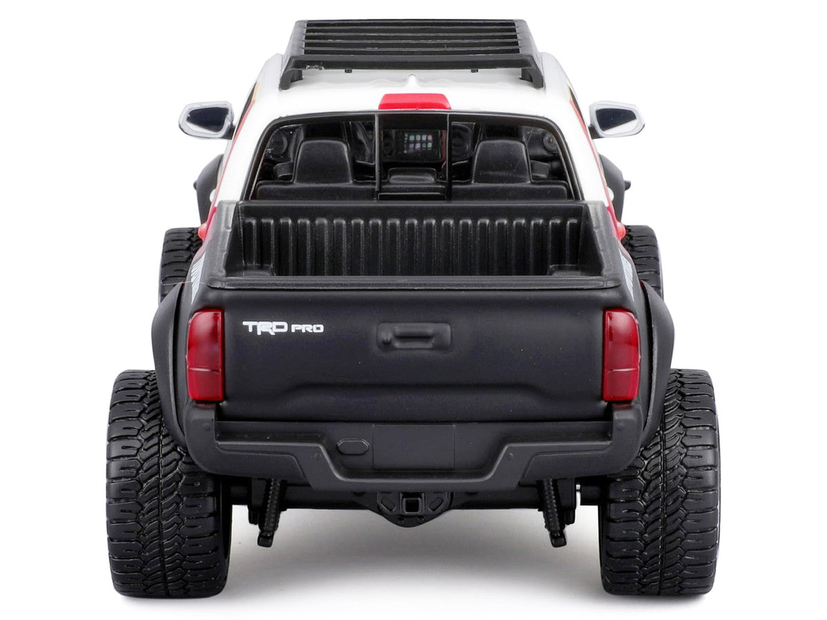 2023 Toyota Tacoma TRD PRO Off Road Pickup Truck White with Graphics and Roof Rack "Maisto Design" Series 1/27 Diecast Model Car Maisto LuxuryLifeWay Online Store