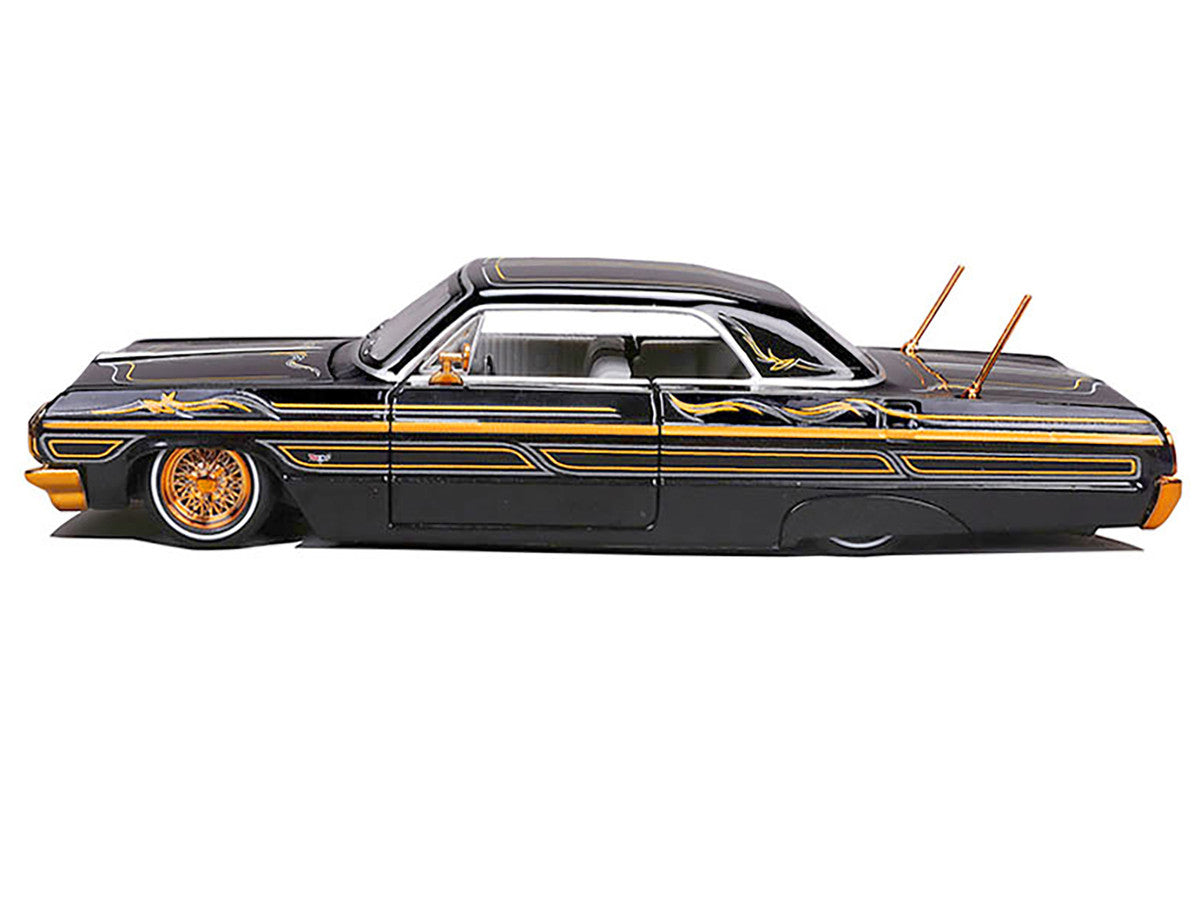 1964 Chevrolet Impala SS Lowrider Black Metallic with Gold Graphics and Gray Interior "Lowriders" "Maisto Design" Series 1/26 Diecast Model Car by Maisto LuxuryLifeWay Online Store
