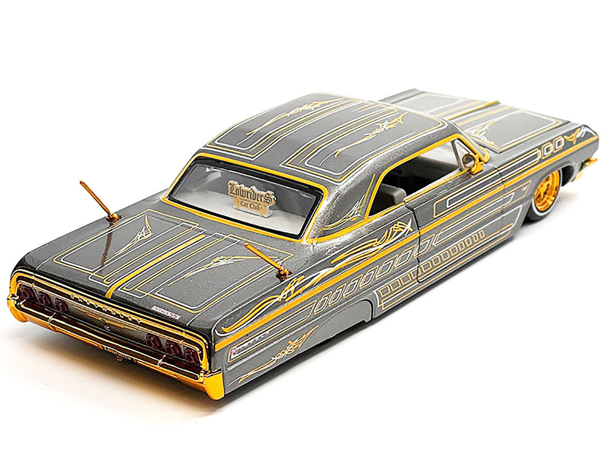 1964 Chevrolet Impala SS Lowrider Gray Metallic with Gold Graphics "Lowriders" "Maisto Design" Series 1/26 Diecast Model Car by Maisto LuxuryLifeWay Online Store