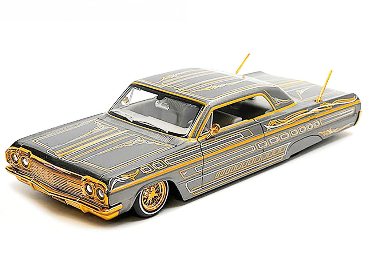 1964 Chevrolet Impala SS Lowrider Gray Metallic with Gold Graphics "Lowriders" "Maisto Design" Series 1/26 Diecast Model Car by Maisto LuxuryLifeWay Online Store