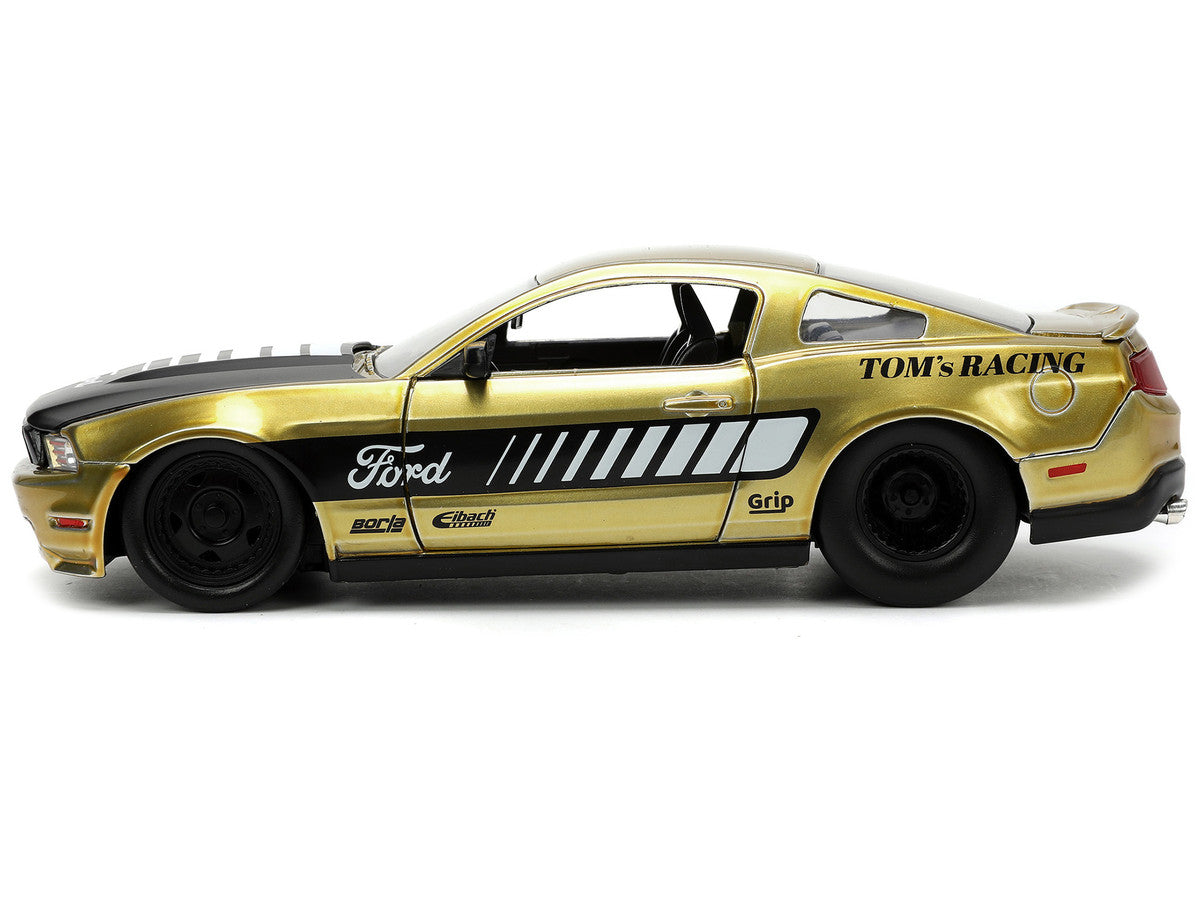 2010 Ford Mustang GT Gold Metallic with Black Graphics and Hood "Tom's Racing" "Bigtime Muscle" Series 1/24 Diecast Model Car by Jada LuxuryLifeWay Online Store