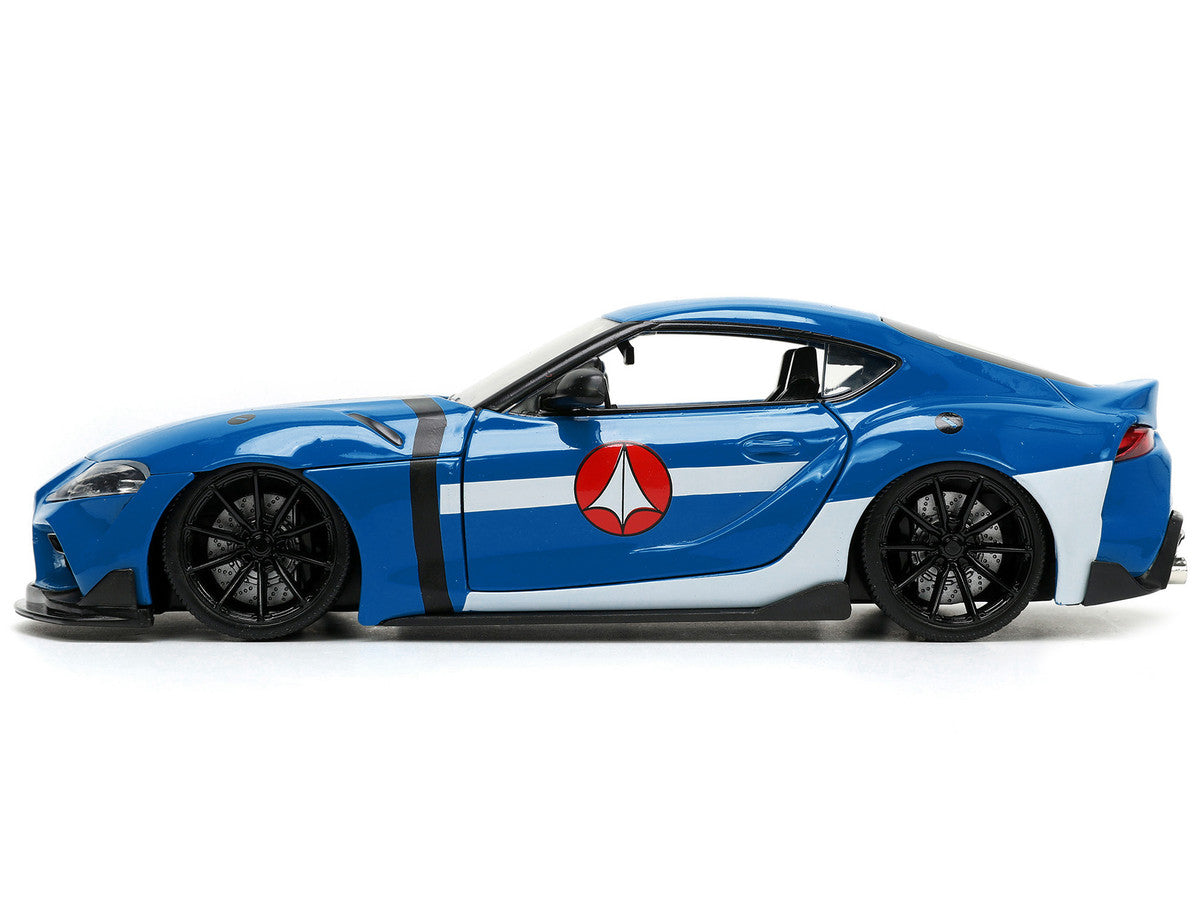 2020 Toyota Supra Blue with Graphics and Max Sterling Diecast Figurine "Robotech" "Hollywood Rides" Series 1/24 Diecast Model Car by Jada LuxuryLifeWay Online Store