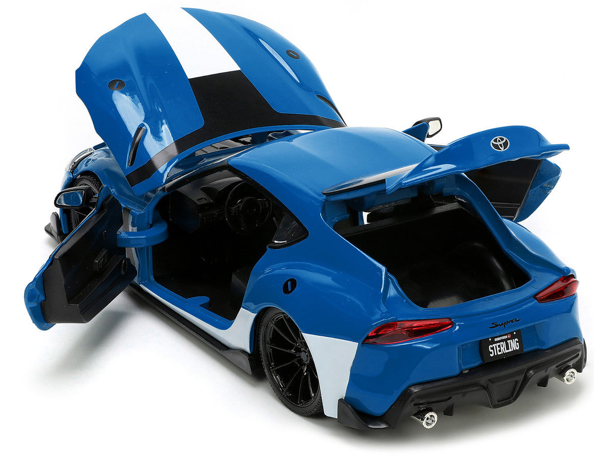 2020 Toyota Supra Blue with Graphics and Max Sterling Diecast Figurine "Robotech" "Hollywood Rides" Series 1/24 Diecast Model Car by Jada LuxuryLifeWay Online Store