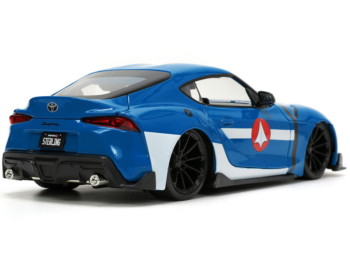2020 Toyota Supra Blue with Graphics and Max Sterling Diecast Figurine "Robotech" "Hollywood Rides" Series 1/24 Diecast Model Car by Jada LuxuryLifeWay Online Store