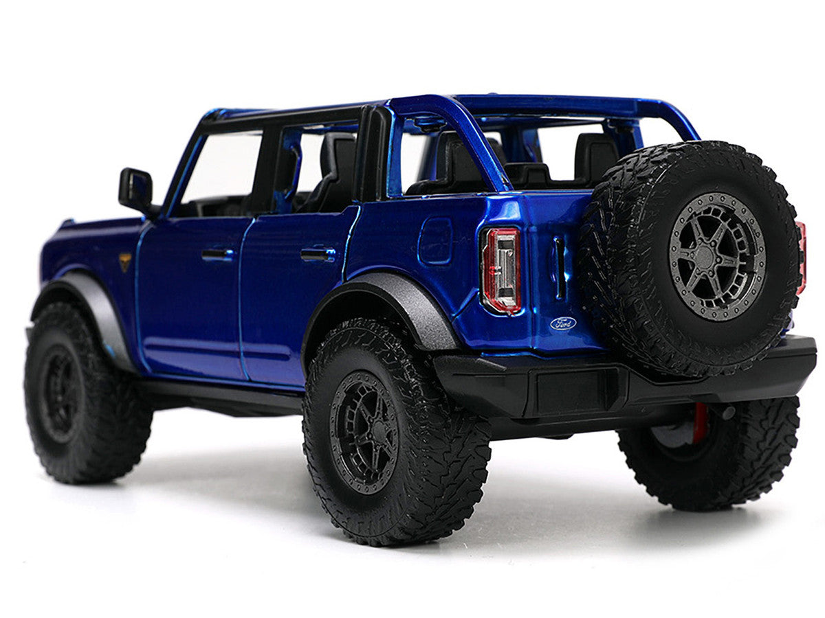 2021 Ford Bronco Open-Top Candy Blue Metallic with Extra Wheels "Just Trucks" Series 1/24 Diecast Model Car by Jada LuxuryLifeWay Online Store