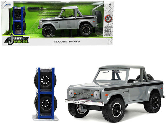 1973 Ford Bronco Pickup Truck Gray with Black Stripes with Extra Wheels "Just Trucks" Series 1/24 Diecast Model Car by Jada LuxuryLifeWay Online Store
