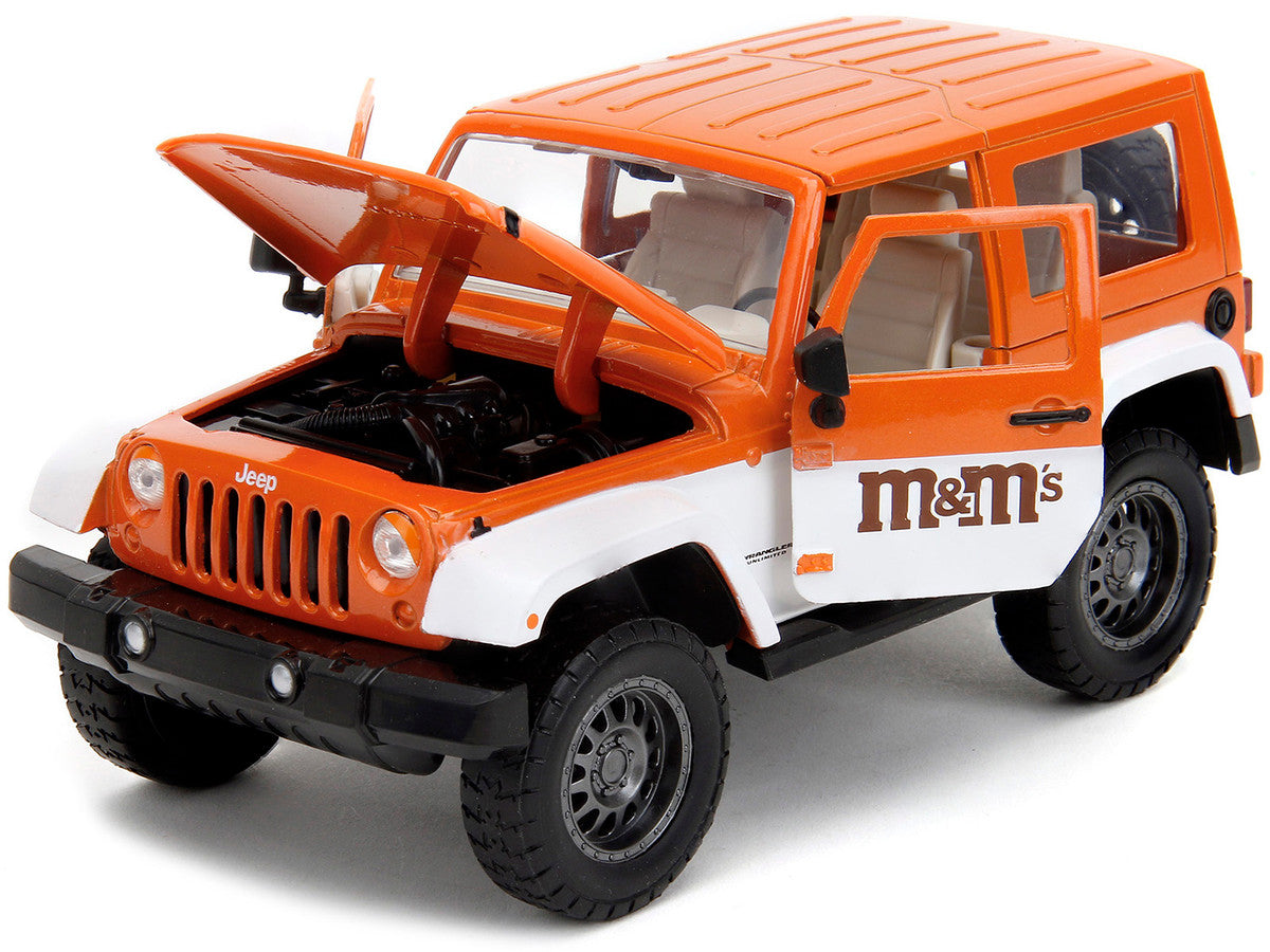 2007 Jeep Wrangler Orange Metallic and White and Orange M&M Diecast Figure "M&M's" "Hollywood Rides" Series 1/24 Diecast Model Car by Jada LuxuryLifeWay Online Store