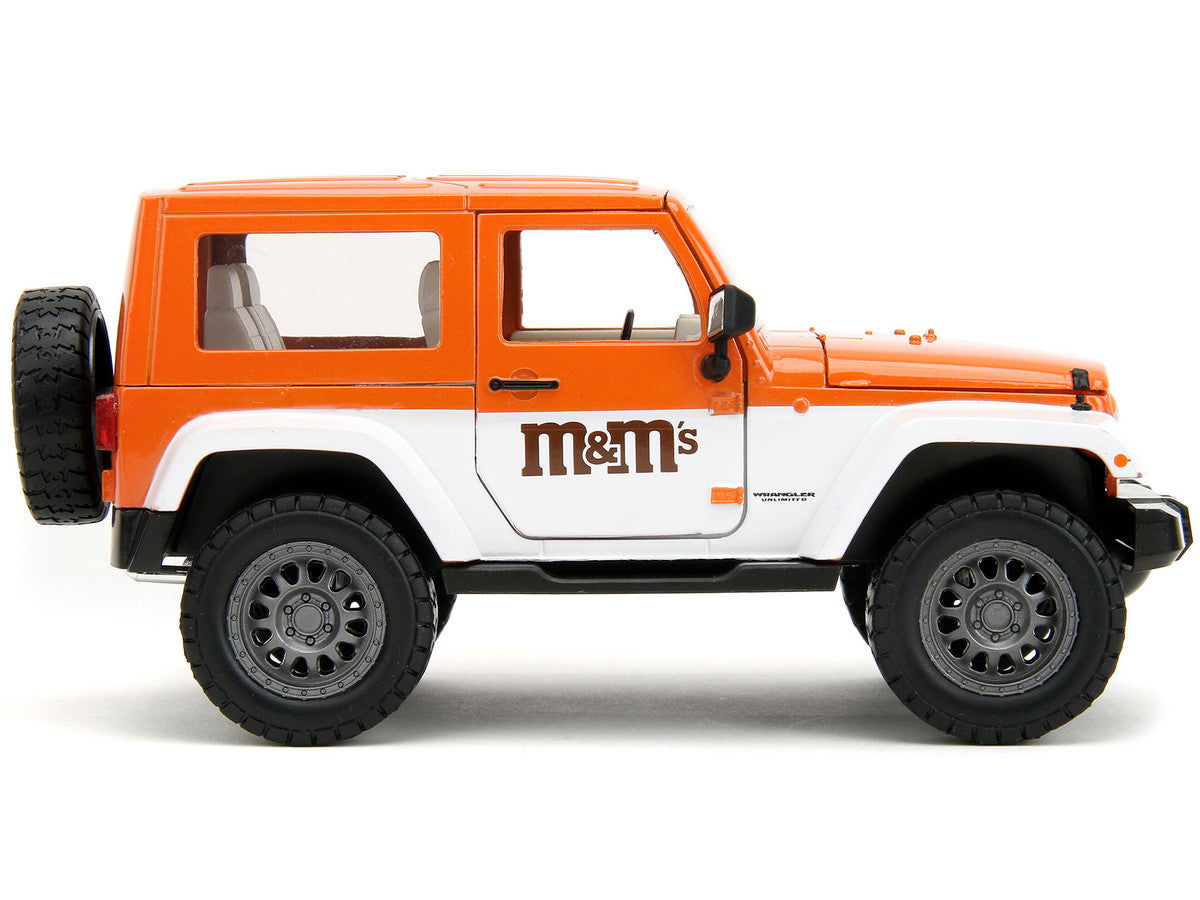 2007 Jeep Wrangler Orange Metallic and White and Orange M&M Diecast Figure "M&M's" "Hollywood Rides" Series 1/24 Diecast Model Car by Jada LuxuryLifeWay Online Store