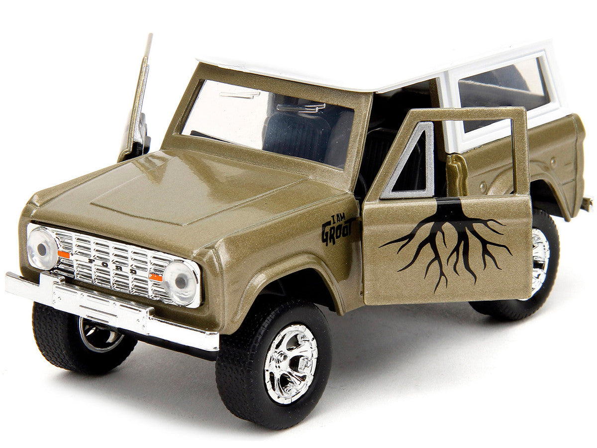 1973 Ford Bronco Gold Metallic with White Top and Groot Diecast Figure "Guardians of the Galaxy" "Marvel" Series 1/32 Diecast Model Car by Jada LuxuryLifeWay Online Store