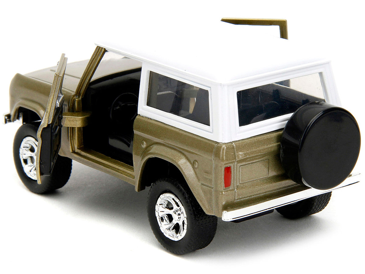 1973 Ford Bronco Gold Metallic with White Top and Groot Diecast Figure "Guardians of the Galaxy" "Marvel" Series 1/32 Diecast Model Car by Jada LuxuryLifeWay Online Store