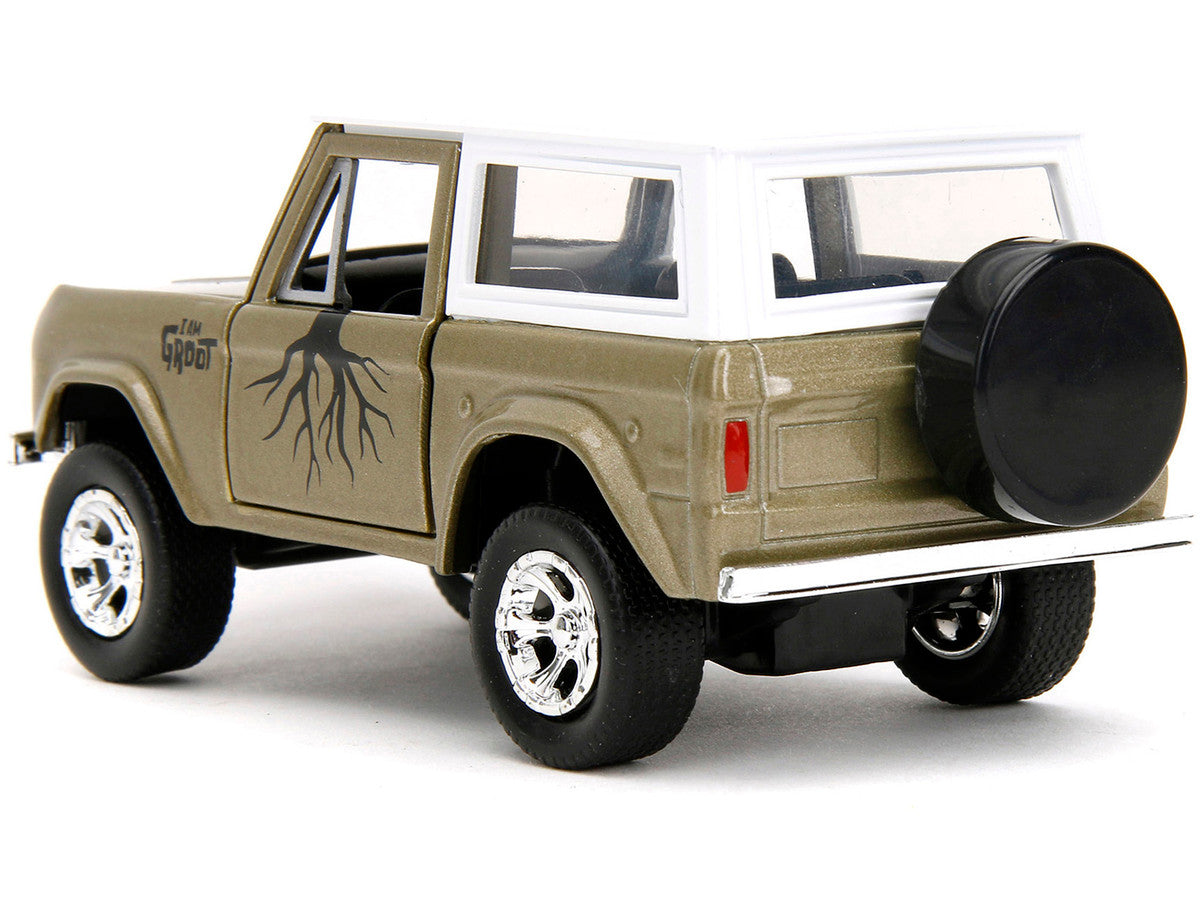 1973 Ford Bronco Gold Metallic with White Top and Groot Diecast Figure "Guardians of the Galaxy" "Marvel" Series 1/32 Diecast Model Car by Jada LuxuryLifeWay Online Store