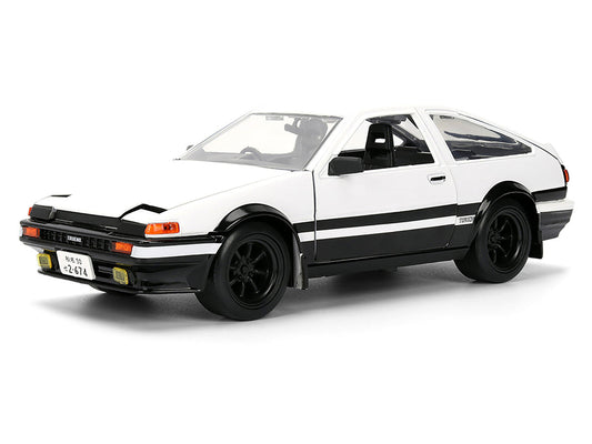 Toyota Trueno (AE86) RHD (Right Hand Drive) White and Black with Graphics and Takumi Diecast Figure "Initial D" (1998-2021) TV Series "Anime Hollywood Rides" Series 1/24 Diecast Model by Jada LuxuryLifeWay Online Store