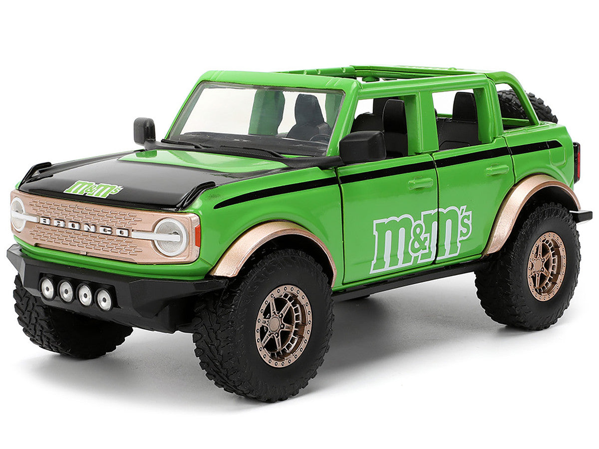 2021 Ford Bronco Green with Black Stripes and Green M&M's Diecast Figure "Hollywood Rides" Series 1/24 Diecast Model Car by Jada LuxuryLifeWay Online Store