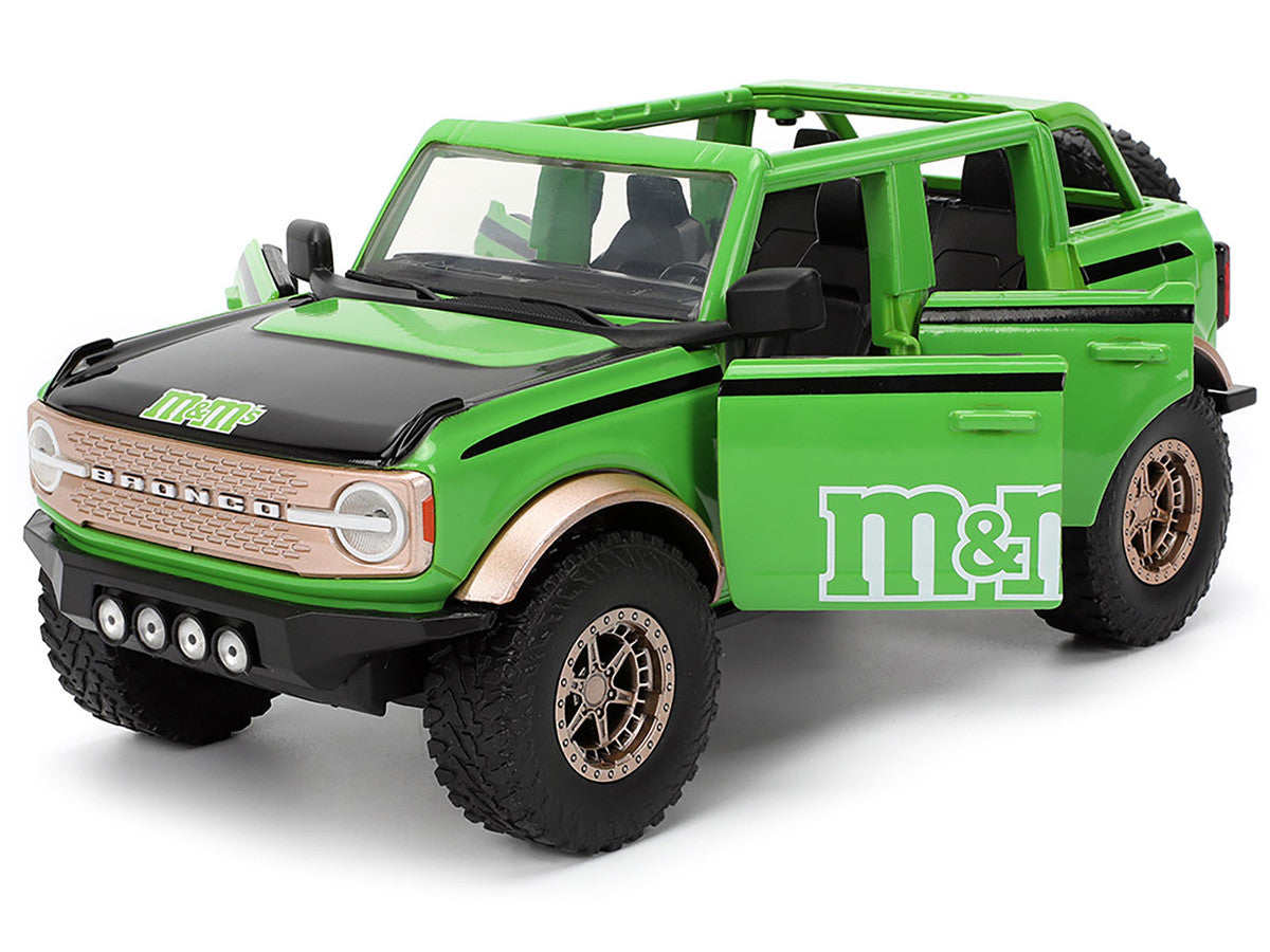 2021 Ford Bronco Green with Black Stripes and Green M&M's Diecast Figure "Hollywood Rides" Series 1/24 Diecast Model Car by Jada LuxuryLifeWay Online Store