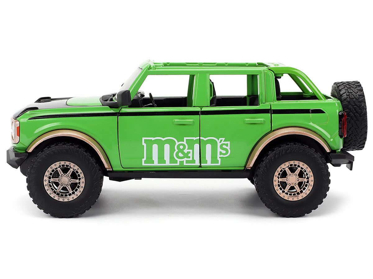 2021 Ford Bronco Green with Black Stripes and Green M&M's Diecast Figure "Hollywood Rides" Series 1/24 Diecast Model Car by Jada LuxuryLifeWay Online Store
