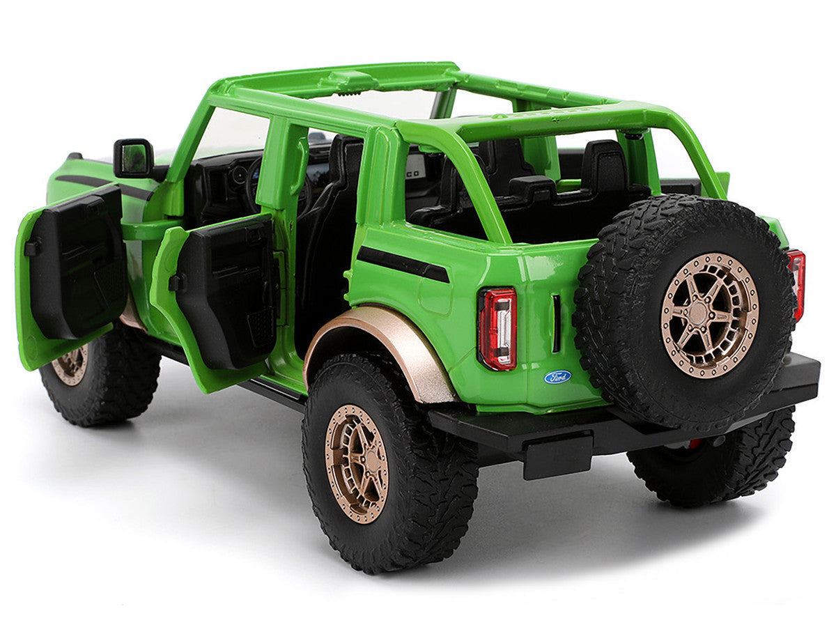 2021 Ford Bronco Green with Black Stripes and Green M&M's Diecast Figure "Hollywood Rides" Series 1/24 Diecast Model Car by Jada LuxuryLifeWay Online Store