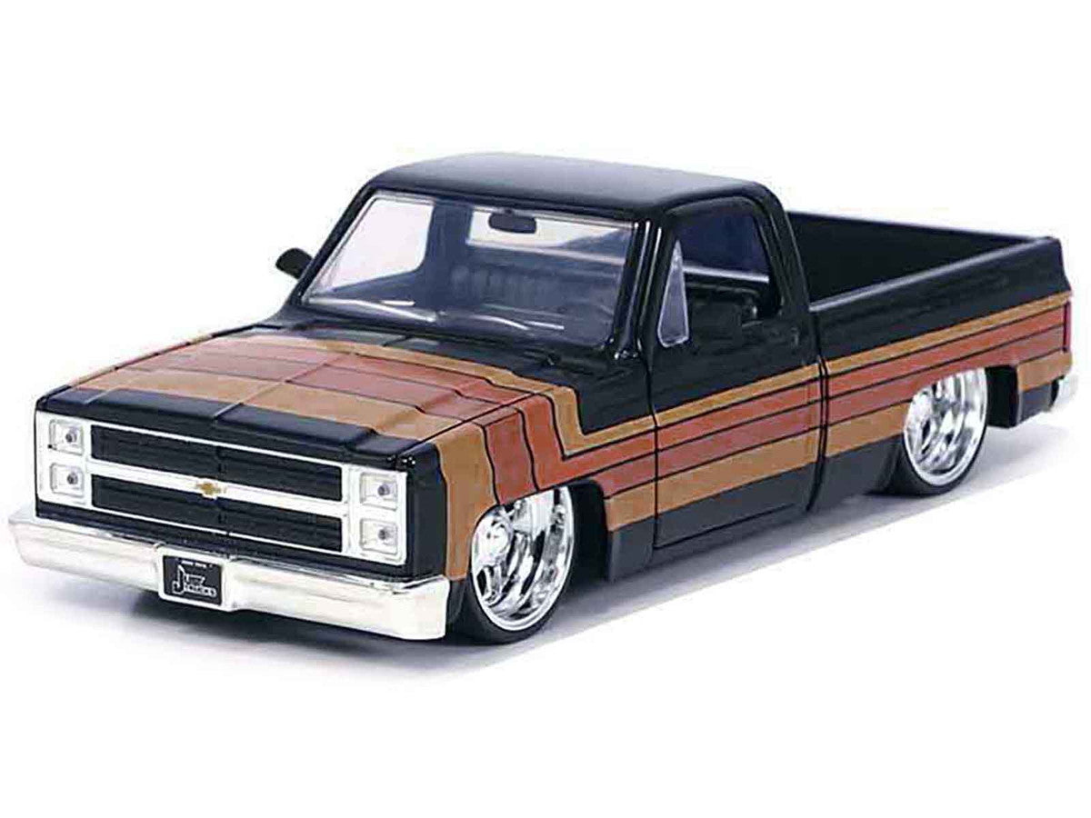 1985 Chevrolet C-10 Pickup Truck Black with Stripes and Paradox Wheels "Just Trucks" Series 1/24 Diecast Model Car by Jada LuxuryLifeWay Online Store