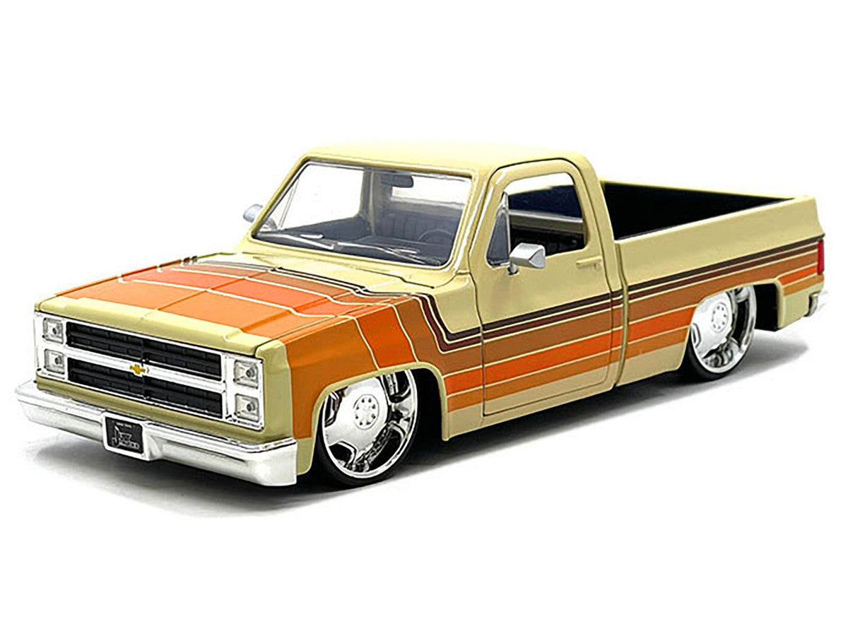 1985 Chevrolet C-10 Pickup Truck Beige with Stripes and Lowenhart Wheels "Just Trucks" Series 1/24 Diecast Model Car by Jada LuxuryLifeWay Online Store