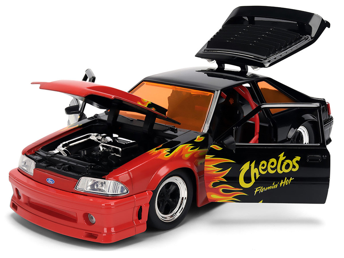 1989 Ford Mustang GT Black with Red Flame Graphics and Chester Cheetah Diecast Figure "Cheetos Flamin' Hot" "Hollywood Rides" Series 1/24 Diecast Model Car by Jada LuxuryLifeWay Online Store