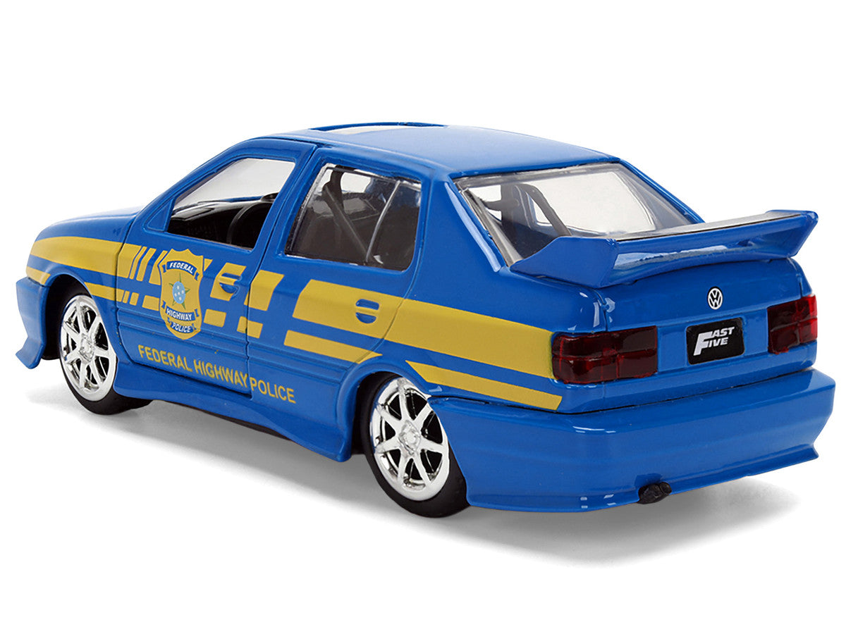 Volkswagen Jetta Police Vehicle "Rio Federal Highway Police" Blue with Yellow Stripes "Fast Five" (2011) Movie "Fast & Furious" Series 1/32 Diecast Model Car by Jada LuxuryLifeWay Online Store