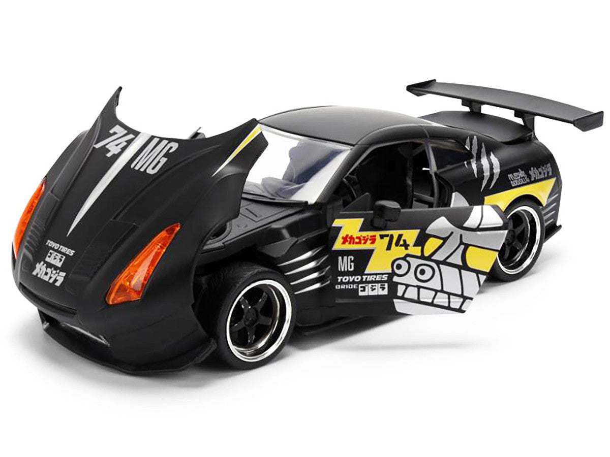 2009 Nissan GT-R (R35) Ben Sopra Matt Black with "Mechagodzilla" Graphics "Hollywood Rides" Series 1/24 Diecast Model Car by Jada LuxuryLifeWay Online Store