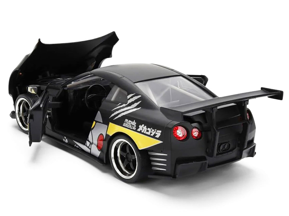 2009 Nissan GT-R (R35) Ben Sopra Matt Black with "Mechagodzilla" Graphics "Hollywood Rides" Series 1/24 Diecast Model Car by Jada LuxuryLifeWay Online Store