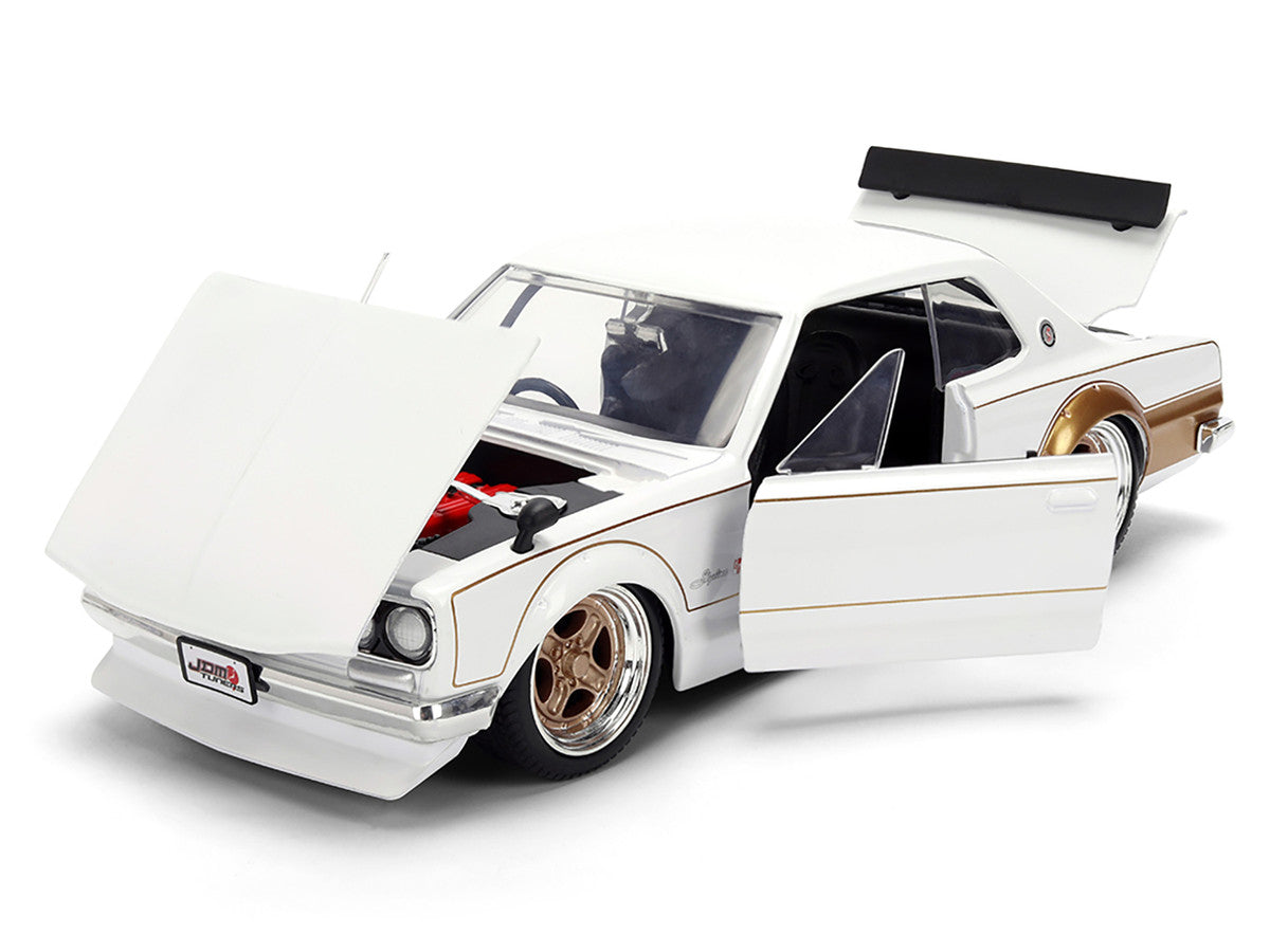 1971 Nissan Skyline 2000GT-R RHD (Right Hand Drive) White with Gold Graphics "JDM Tuners" Series 1/24 Diecast Model Car by Jada LuxuryLifeWay Online Store