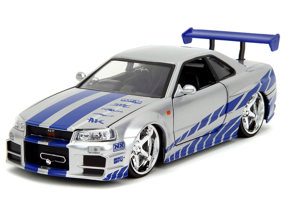 Brian's Nissan Skyline GT-R (R34) Silver Metallic with Blue Stripes and Suki's Honda S2000 Pink with Graphics Set of 2 Cars "Fast & Furious 25th Anniversary" "Fast & Furious" Series 1/24 Diecast Model Cars by Jada LuxuryLifeWay Online Store