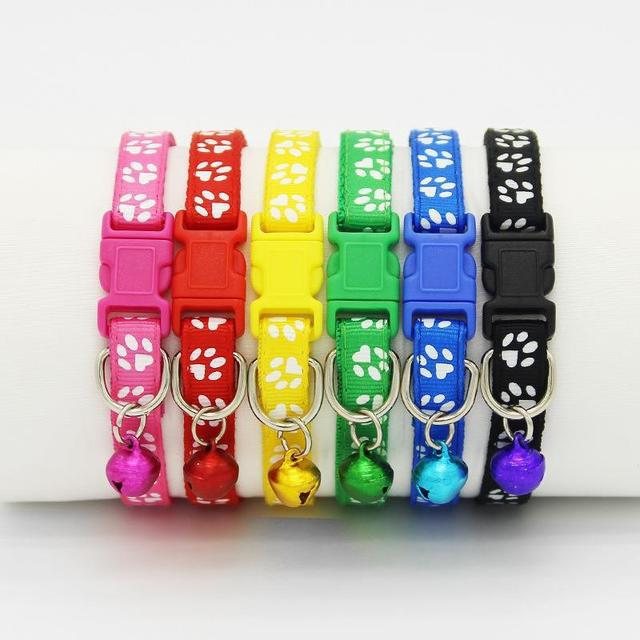 The pet cat wears a bell collar Pets Fashion