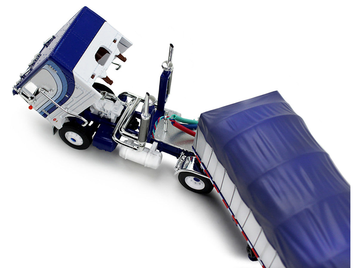 Peterbilt 352 COE 110" Sleeper and 53’ Wilson Roadbrute Flatbed Trailer with Covered Wagon White with Blue Stripes 1/64 Diecast Model by DCP/First Gear LuxuryLifeWay Online Store