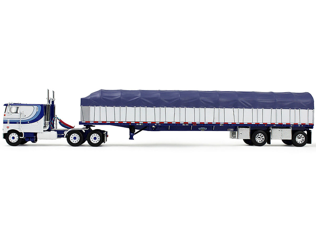 Peterbilt 352 COE 110" Sleeper and 53’ Wilson Roadbrute Flatbed Trailer with Covered Wagon White with Blue Stripes 1/64 Diecast Model by DCP/First Gear LuxuryLifeWay Online Store