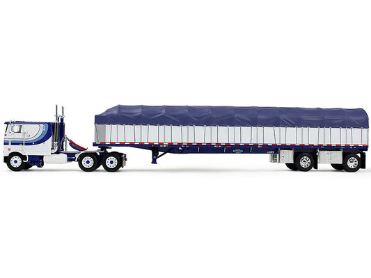 Peterbilt 352 COE 110" Sleeper and 53’ Wilson Roadbrute Flatbed Trailer with Covered Wagon White with Blue Stripes 1/64 Diecast Model by DCP/First Gear LuxuryLifeWay Online Store
