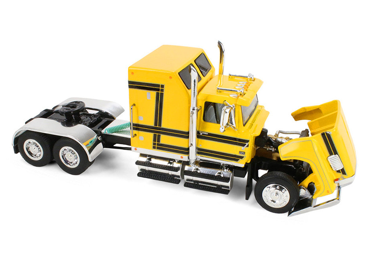 Ford LTL 9000 with 60" Aerodyne Sleeper and 53' Wilson Roadbrute Flatbed Trailer with Covered Wagon Yellow with Black Stripes 1/64 Diecast Model by DCP/First Gear LuxuryLifeWay Online Store