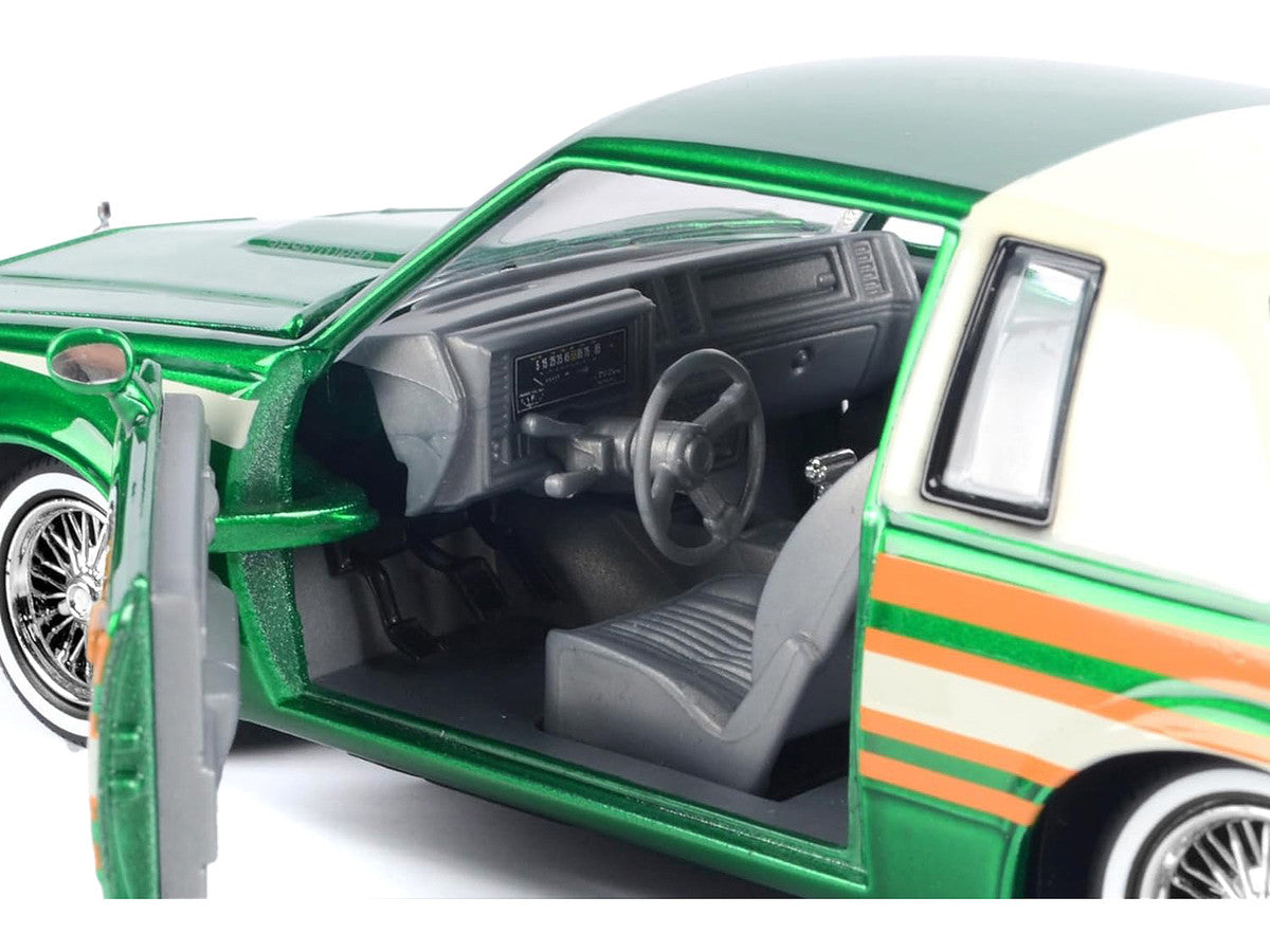 1987 Buick Regal 3.8 SFI Turbo Green Metallic and Cream with Graphics "Get Low" Series 1/24 Diecast Model Car by Motormax LuxuryLifeWay Online Store