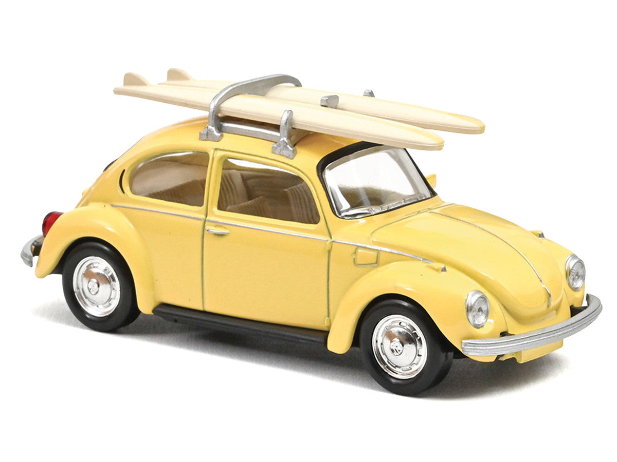 1973 Volkswagen Beetle 1303 Pastel Yellow with Roof Rack and 2 Surfboards 1/43 Diecast Model Car by Norev LuxuryLifeWay Online Store