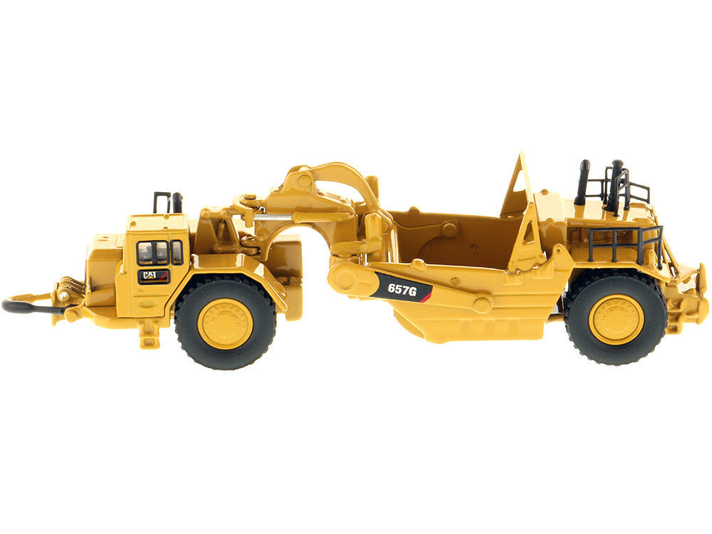 CAT Caterpillar 657G Wheeled Scraper Tractor "High Line" Series 1/125 Diecast Model by Diecast Masters LuxuryLifeWay Online Store