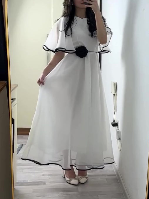 White Chiffon Maxi Dress With Black Trim And Floral Accent NorixaFashion.com