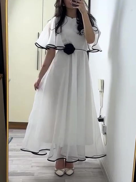 White Chiffon Maxi Dress With Black Trim And Floral Accent NorixaFashion.com