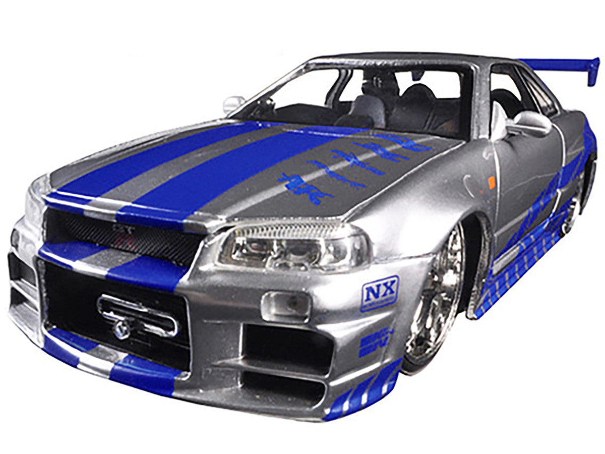 Brian's Nissan GTR Skyline R34 RHD (Right Hand Drive) Silver with Blue Stripes "Fast & Furious" Movie 1/24 Diecast Model Car by Jada LuxuryLifeWay Online Store