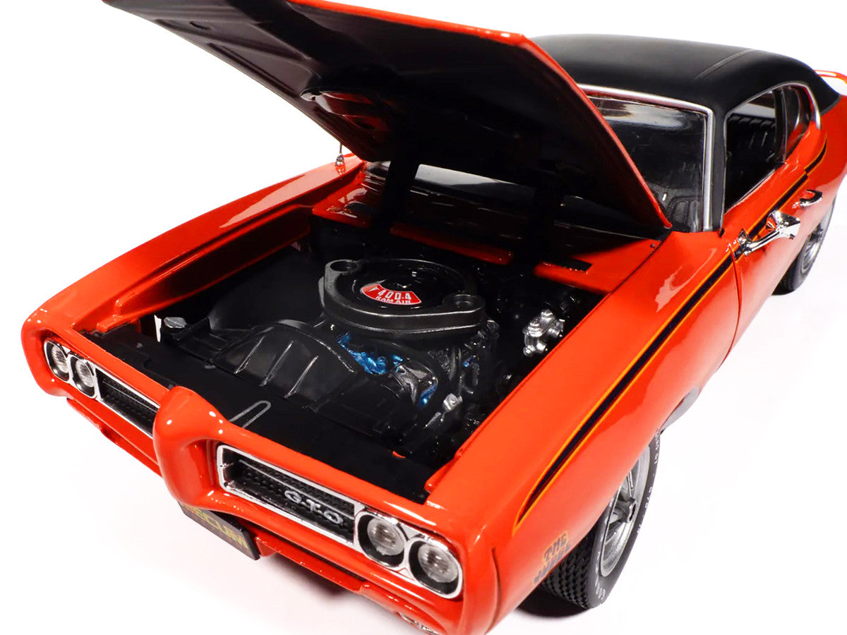 1969 Pontiac GTO Judge Carousel Red with Black Stripes and Black Vinyl Top "Mecum Auctions" "American Muscle" Series 1/18 Diecast Model Car by Auto World LuxuryLifeWay Online Store