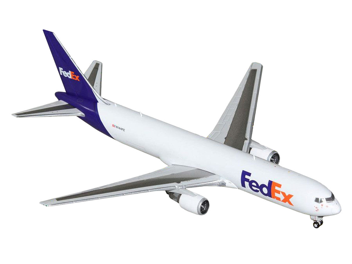 Boeing 767-300F Commercial Aircraft "FedEx (Federal Express)" (N144FE) White with Purple Tail 1/400 Diecast Model Airplane by GeminiJets LuxuryLifeWay Online Store