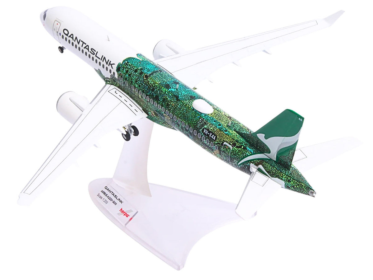 Airbus A220-300 Commercial Aircraft "QantasLink Flying Art Series - Minyma Kutjara Tjukurpa" (VH-X4A) White with Green Graphics 1/200 Diecast Model by Herpa LuxuryLifeWay Online Store