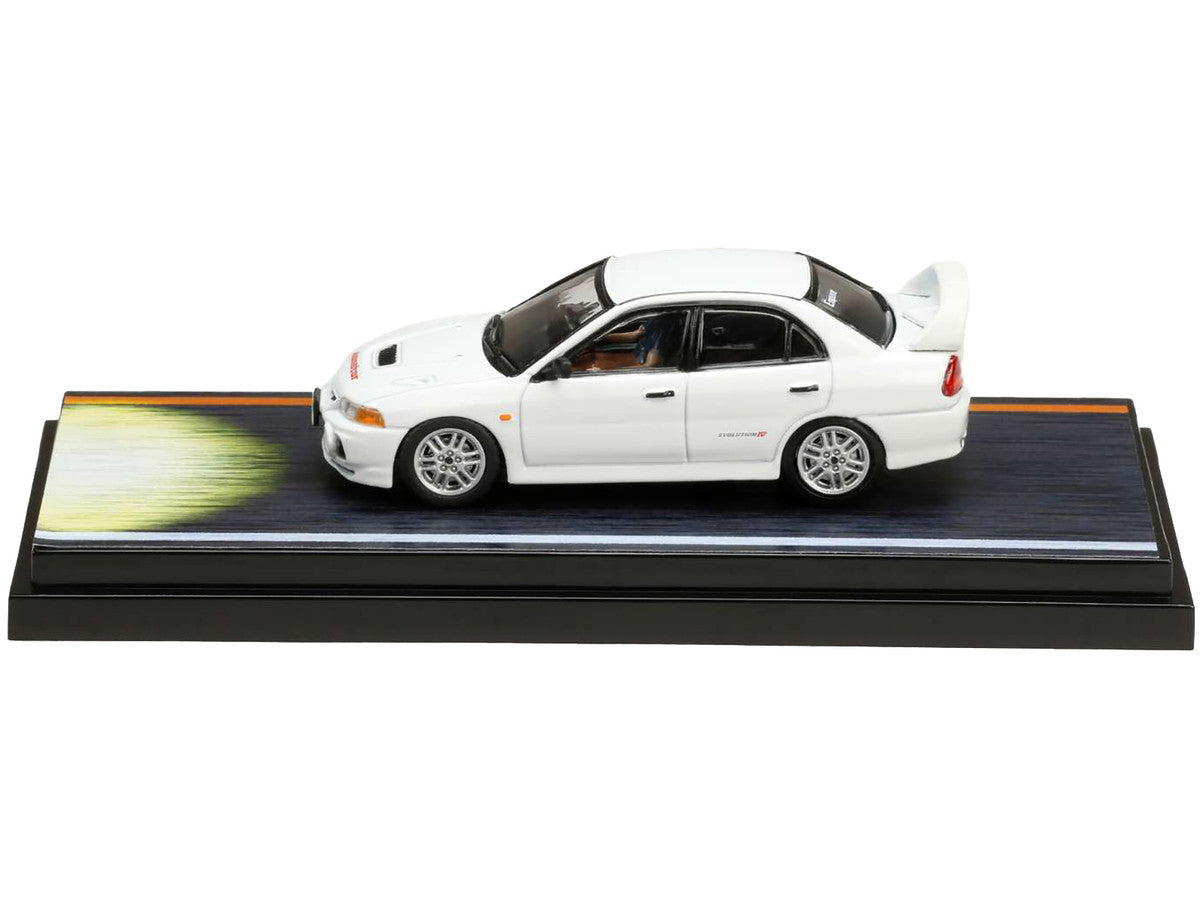 Mitsubishi Lancer RS Evolution IV RHD (Right Hand Drive) White "Monstar" with Seiji Iwaki Driver Figure "Initial D" (1995-2013) Manga 1/64 Diecast Model Car by Hobby Japan LuxuryLifeWay Online Store